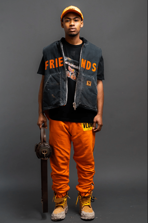 Man stnading wearing Harlem fashionwear