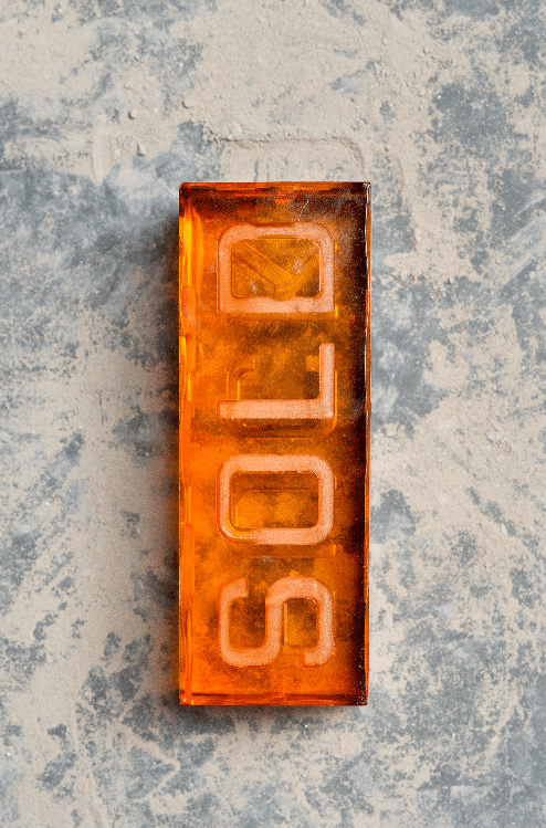 Sold text on a bar