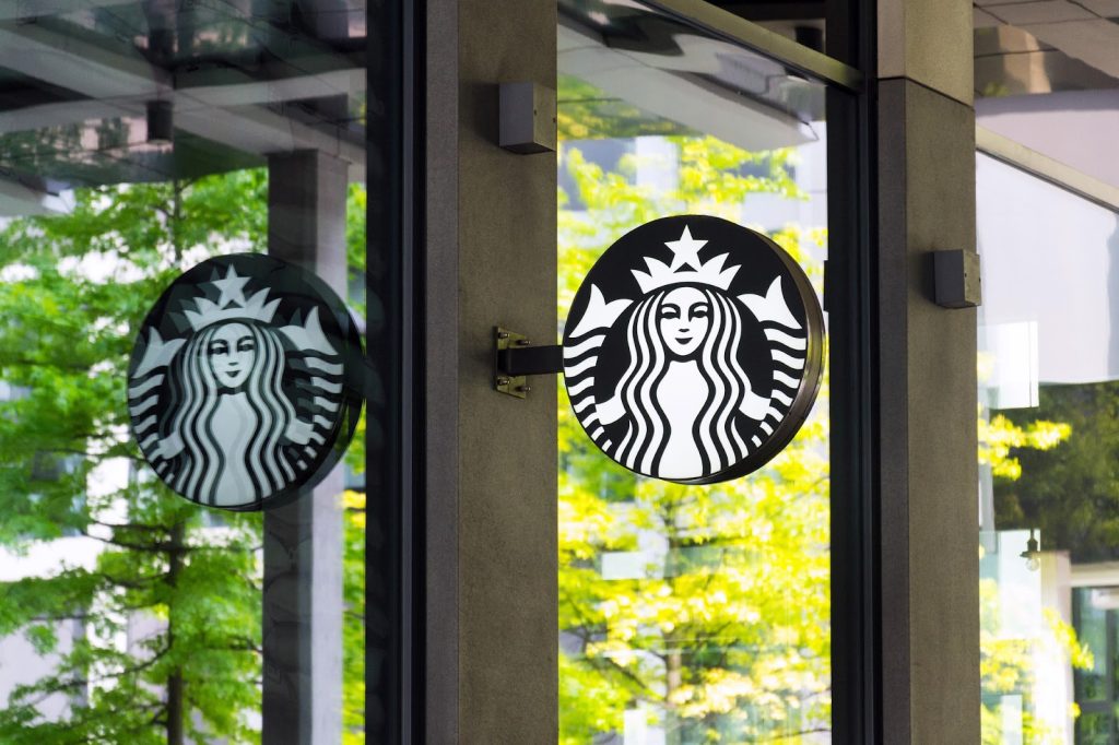 Window with the Starbucks logo on it